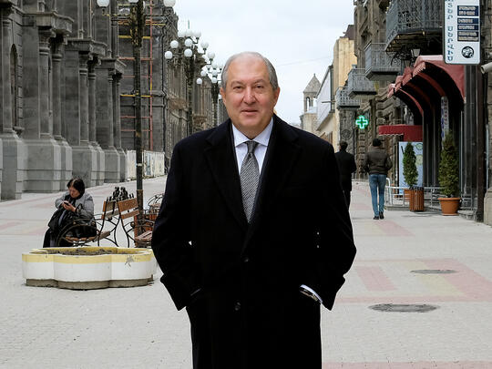 President of Armenia Armen Sarkissian on a recent visit to Gyumri, known as the “City of Statues.” To his left is a likeness of Armenian- American entrepreneur and philanthropist Kirk Kerkorian.