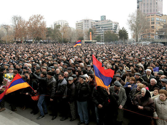 Thousands of Armenian citizens in Freedom Square in Yerevan during a rally in support of democratic reforms on February 22, 2013.