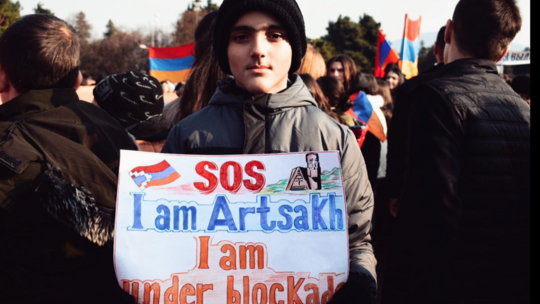 Kid protesting Artsakh blockade